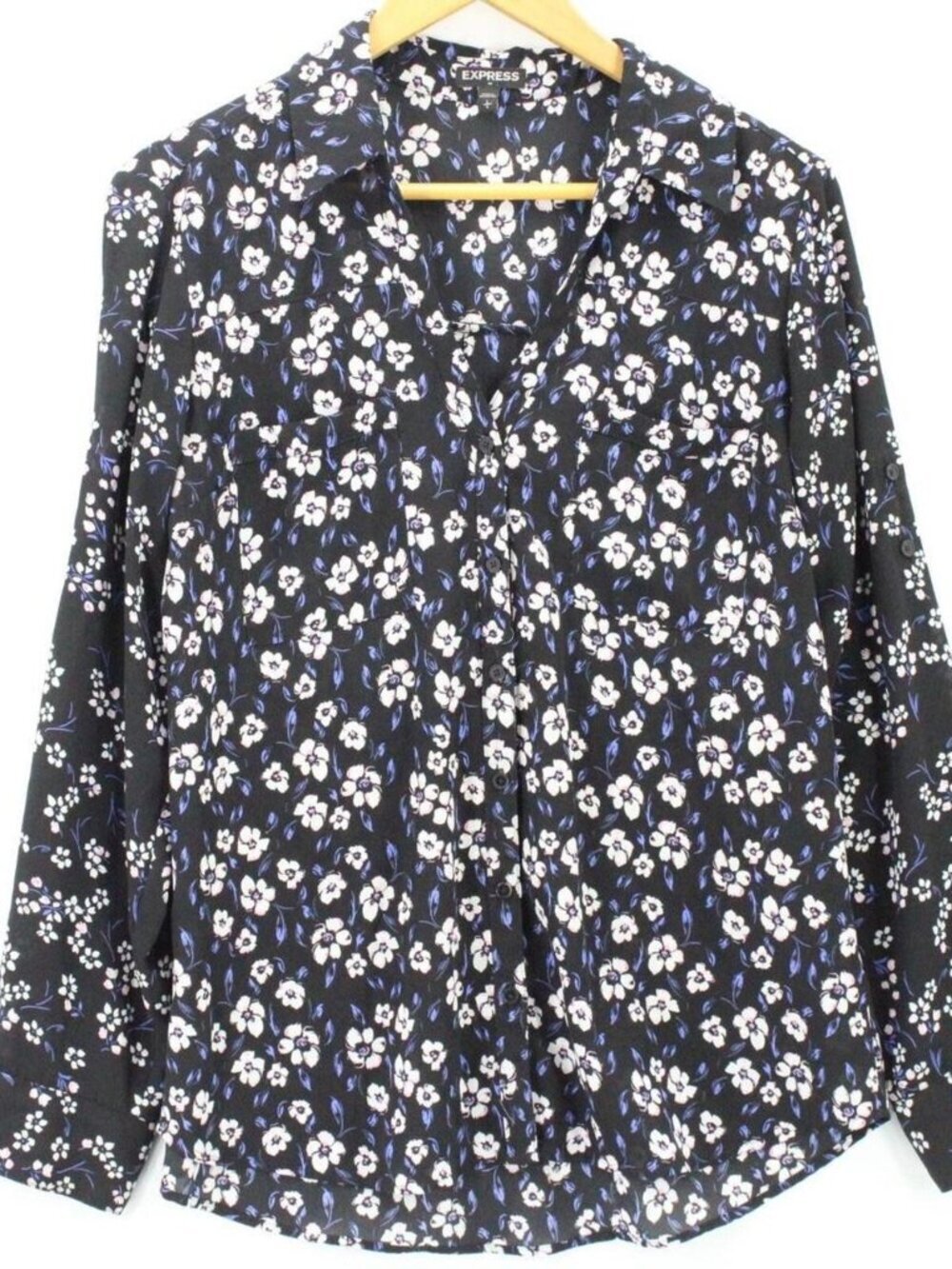 Express black floral blouse with button up front and long sleeves. Size: XS
